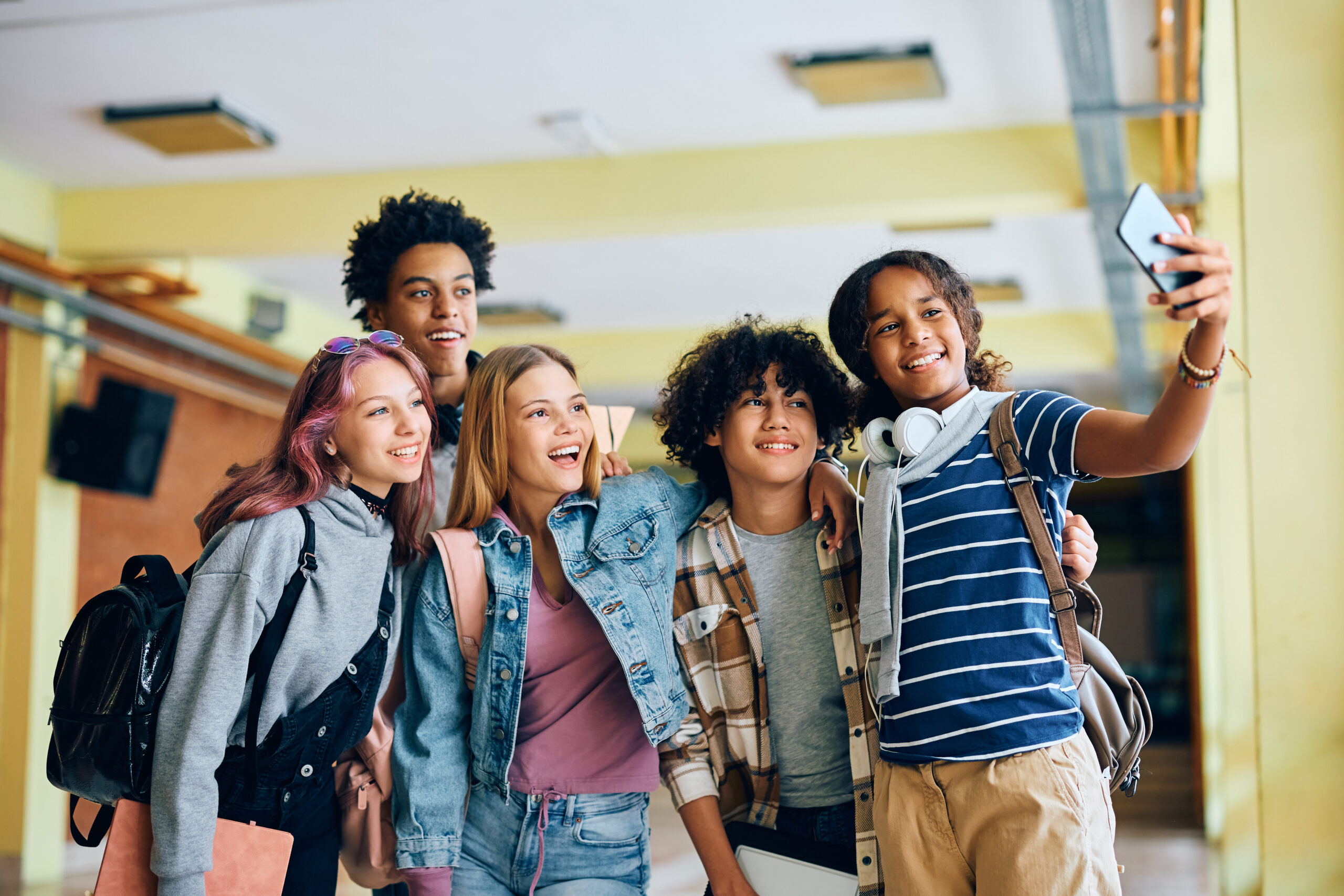 School teen group, some with braces. Dr. Tisseront, children, teens and adult orthodontist; Reston, VA orthodontist